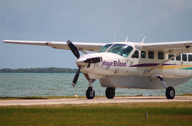 A Maya Island Air plane on the runway