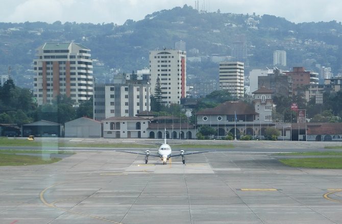 can you go to the gate to meet passengers at the guatemala city airport?